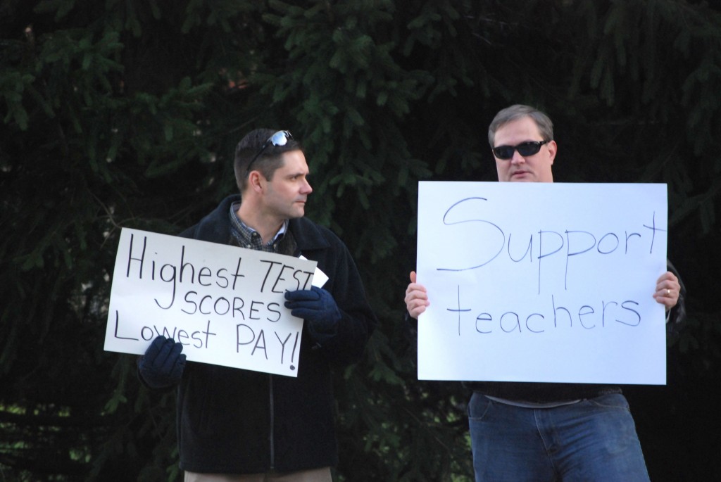 (Carmel-Clay school teachers staged a protest on Nov. 27, 2012 at Woodbrook Elementary School. The demonstration came in response to teachers’ unhappiness with the lack of a contract. (Current archives photo by Amelia Nelson from Dec. 2012)