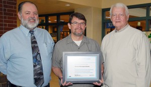 Sodexo Facilities employees Rick Dawson, Frank Woten and James Stone with the ENERGY STAR Leader award. Not pictured is Energy Education Specialist Matt Kettlebar. (Submitted photo)