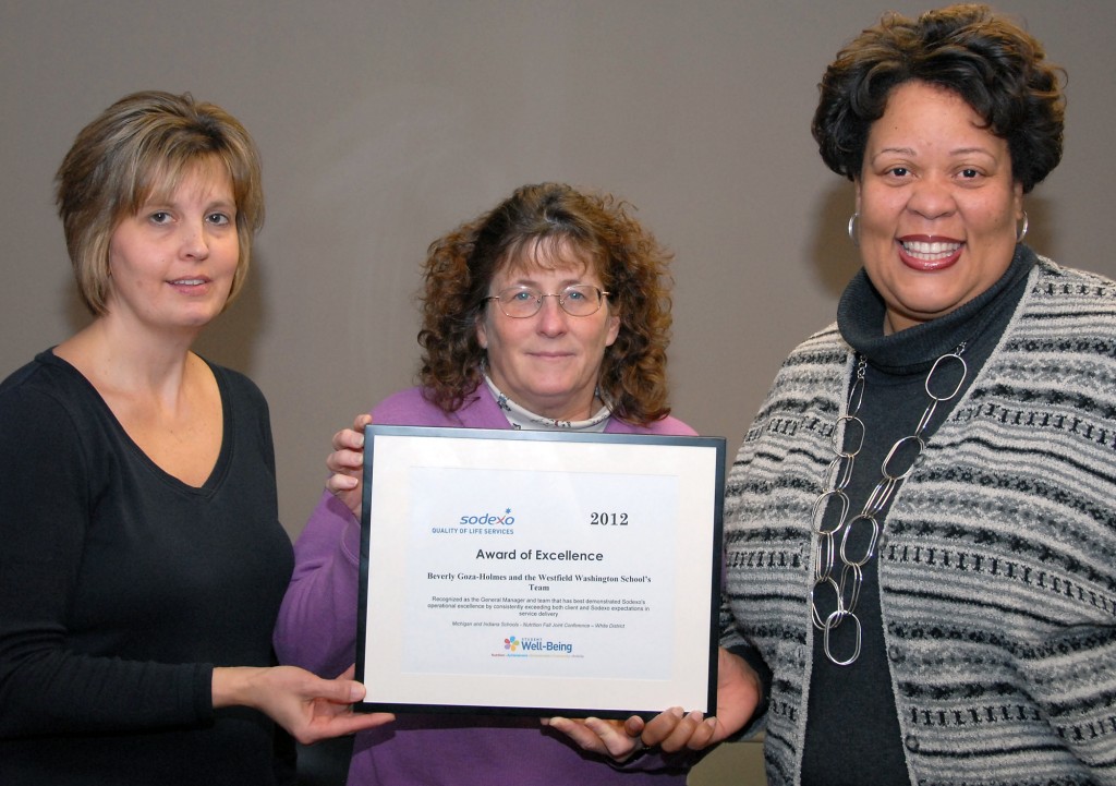 Sodexo Food Service employees Linda McCoy, Susan Luther and Beverly Goza Holmes proudly display the Award of Excellence. Not pictured are the school Café’ employees who greatly contributed to the team receiving the award. (Photo submitted by Tenna Pershing)