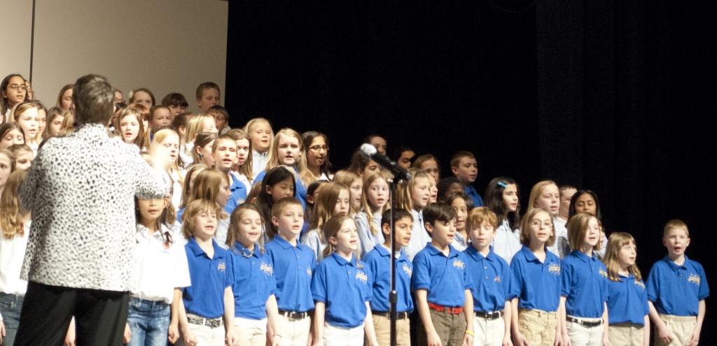 The East Side Mass Choir led by directors Dori Gallinat, Lindsey Ratney Priscilla Shaw and Lisa Sullivan included choirs from Hazel Dell Elementary, Woodbrook Elementary, Prairie Trace Elementary and Mohawk Trails Elementary.