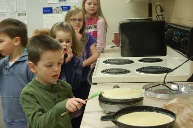 Crêpe-making day at elementary schools – Recently, students in L'École Française tried their hands at making (and eating) crêpes as a fun way to learn about French culture. Pictured are Luke Clyne and fellow classmates from Eagle Elementary. (photo by Heather Lusk)