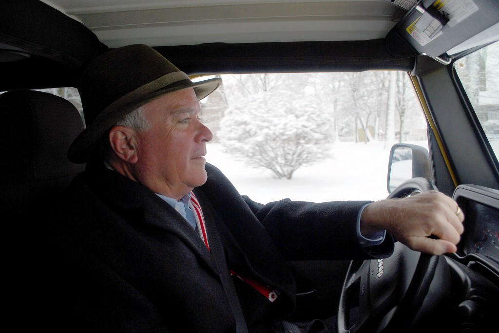 Mayor Andy Cook drives the streets of Westfield in his yellow Jeep looking to assist in the city’s plowing efforts.