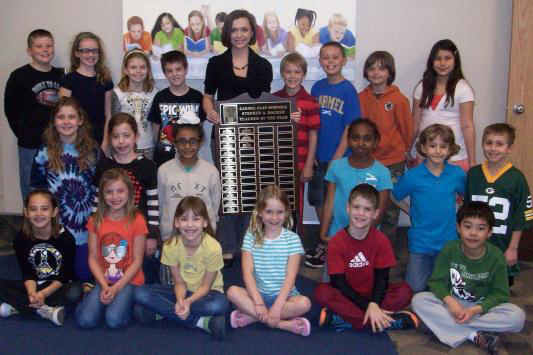 White accepting the Teacher of the Year award alongside her third-grade class. (Submitted photo)