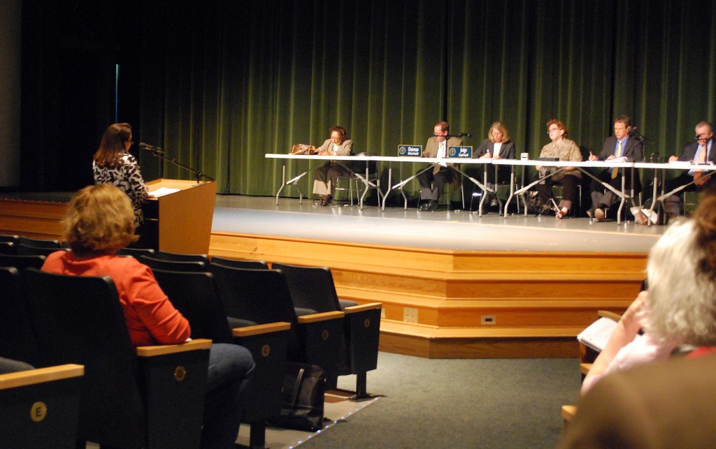 Westfield resident Linda Naas addresses the Indiana Utility Regulatory Commission during its public hearing at Westfield High School on April 9. (Photo by Robert Herrington)