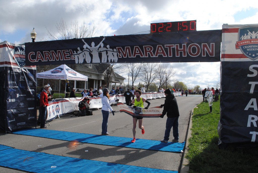 Jesse Davis catching the banner as he takes first place at this year’s marathon.
