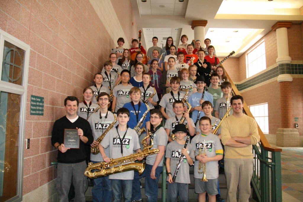 Zionsville Middle School Advanced Jazz Band wins huge honor - The ZMS Advanced Jazz Band won 1st place at the Ball State Jazz Festival on March 9th.  To achieve a first place rating they scored higher than 4 middle schools and 9 high schools.  This is a first for ZMS and a first for any jazz band from Zionsville Community Schools. Dominic Rossi was also honored with the “Frank Mantooth Award” for being the most outstanding musician to perform at Ball State during the festival.  Zionsville Middle School’s Advanced Jazz Band is under the direction of Josh Weirich and Chris Murray with over 100 students participate in the extra-curricular jazz program at ZMS.  Pictured here are members of the ZMS Advanced Jazz Band.  