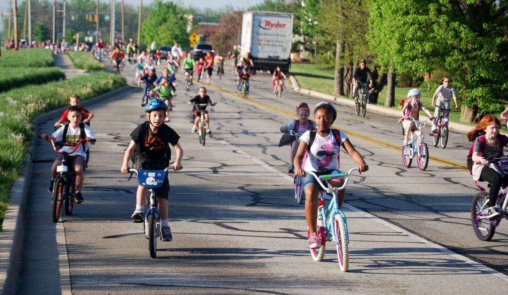 Washington Woods Elementary students head to school on Grassy Branch Road during Bike to School Day on May 8. (Photos by Robert Herrington)