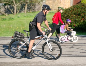 Westfield Police Chief Joel Rush accompanies students, parents and teachers on their way to Washington Woods Elementary School.