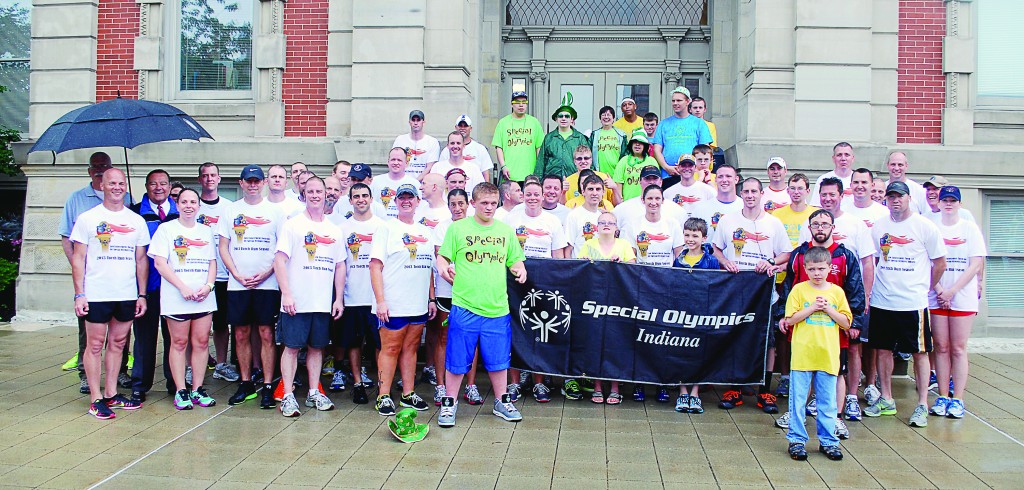 Officers from the Carmel, Fishers, Noblesville and Westfield police departments along with the Hamilton County Sheriff’s Dept., Hamilton County Prosecutor’s Office, Indiana State Police and local Special Olympics athletes gather for a group picture following the countywide Torch Run to raise awareness and funds for Special Olympics Indiana.