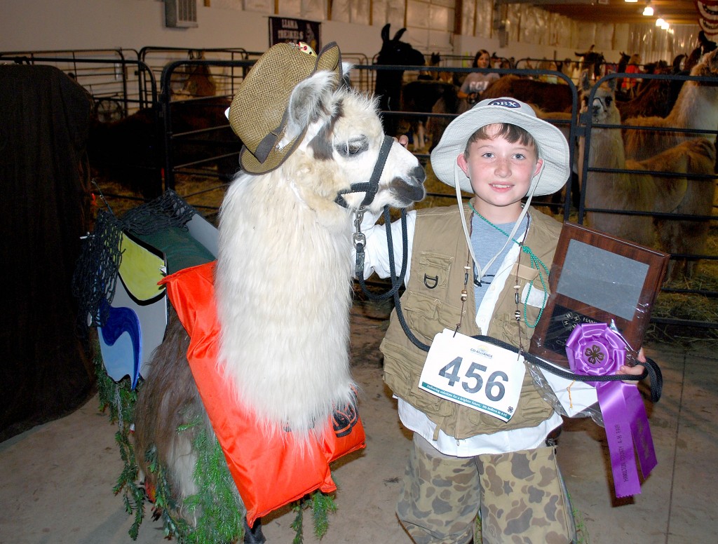 Cooper Sims and his llama, Super Agent, won the Llama costume contest with their fishing theme. (Photo by Robert Herrington)