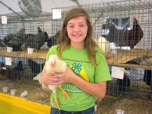 Kylie Dugger with her chicken, Clanky. (Photo by Anna Skinner)
