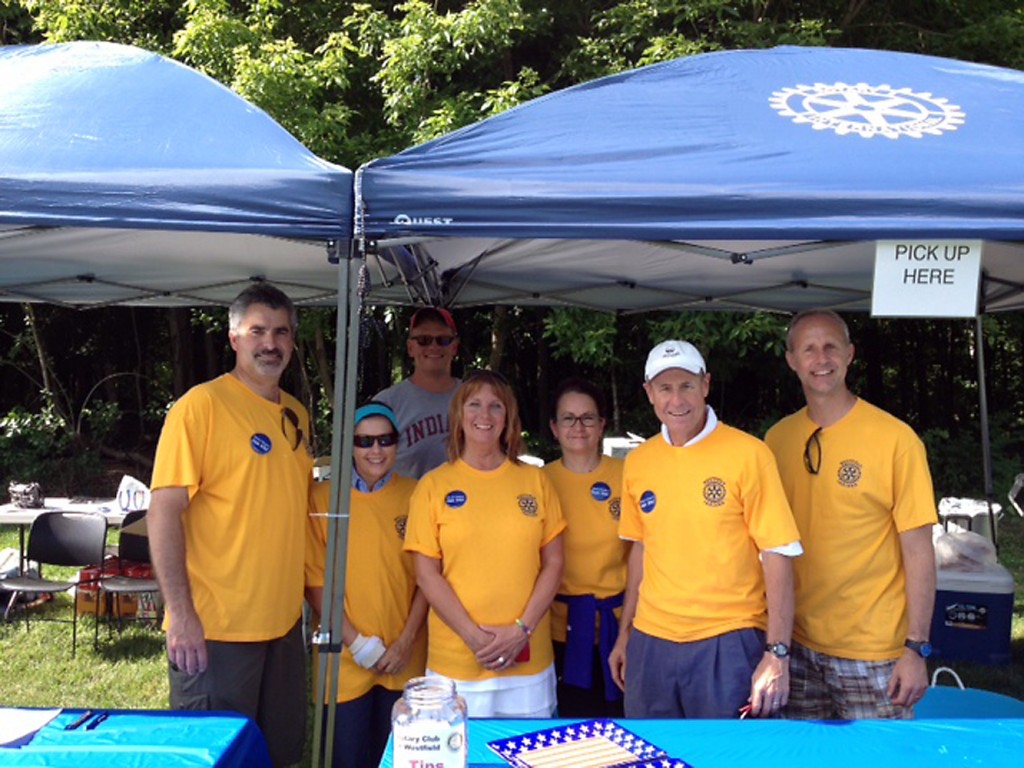 From left: Westfield Rotary Club members Barry Ginder, Sue Read, Matt Skelton, Teresa Skelton, Keltie Domina, Dave Read and Mike Kearns man their food tent during a recent Cool Creek concert. (Photo submitted)