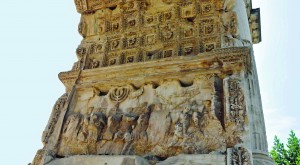 A relief in the Arch of Titus shows Roman troops hauling items looted from the Second Temple. Historians now believe a layer of gold originally covered the plunder shown in the relief. (Submitted photo)