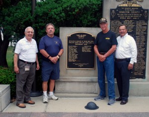 From left: Wayne Long, Ron Wilson, Chuck Lewis and Mayor John Ditslear, all veterans, stand at the Hamilton County Vietnam War Memorial in Noblesville before Lewis continued his journey to Washington, D.C., on Aug. 7.