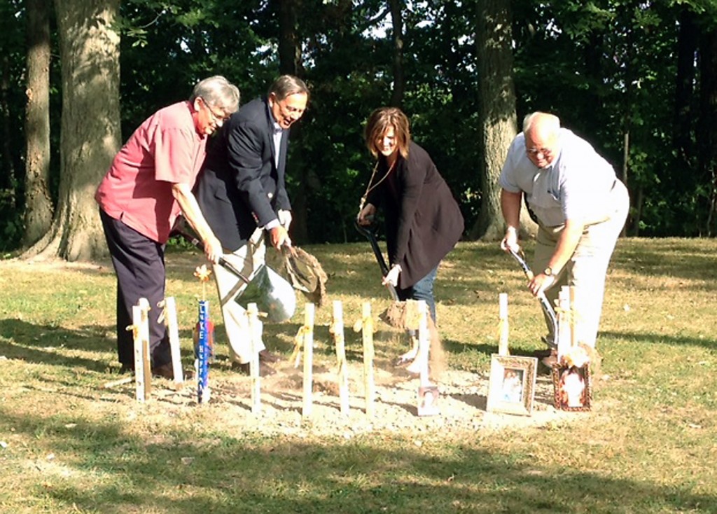 Parks Director Don Seal, Mayor John Ditslear, Parks Board President Ann Minnich and Kirk Forbes break ground for the Angel of Hope memorial in Forest Park. (Submitted photo)