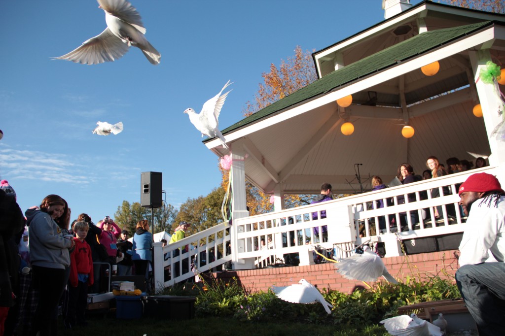 Doves, symbolizing hope, are released during the 2012 closing celebration.