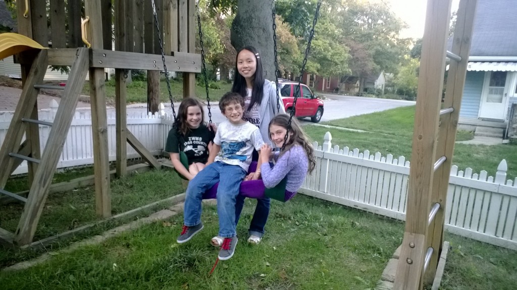 From left, Katie May, Sylvia Qianyu Huang, Zachary May and Kiley May have forged strong bonds through University High School’s exchange student program. (Photo by Katy Franz.)