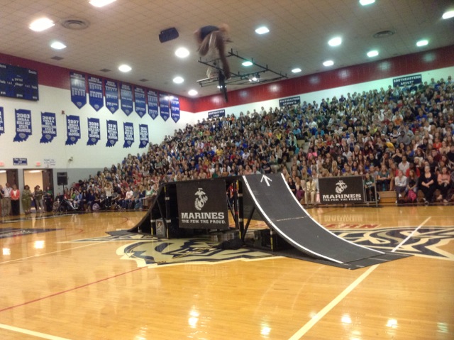 Mykel Larrin of ASA jumps off a box ramp as part of a collection of stunts performed for high school students from Hamilton Southeastern. (Submitted photo)