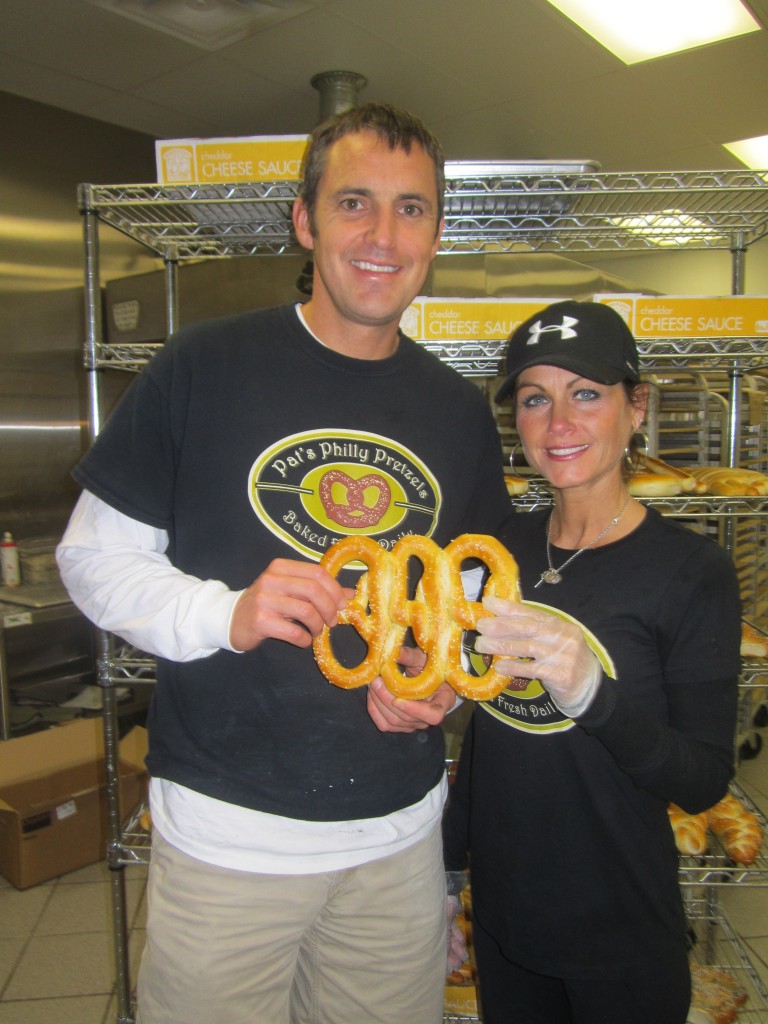 Pat and Erica Wojtalik opened Pat’s Philly Pretzels in June. Their ribbon-cutting ceremony will be held Oct. 25. (Photo by Nancy Edwards.)