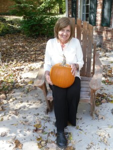 Miriam Nidiffer with a pumpkin that grew from a “Thank You” pumpkin seed. (Submitted photo)