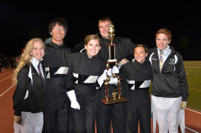 The Marching Eagles finished in the top 10 of bands competing at the ISSMA Marching Band Regional competition held on October 19 at Lafayette Jefferson High School. They advanced to the semi-state competition held at Pike High School on Oct. 26. Drum majors and color guard leaders holding the gold rating trophy from left to right: Sabrina Jones, Alex Wang, Sadie Minnigan, Sam Miles, Natalie Miller, Ashton Lyons. (Submitted photo)
