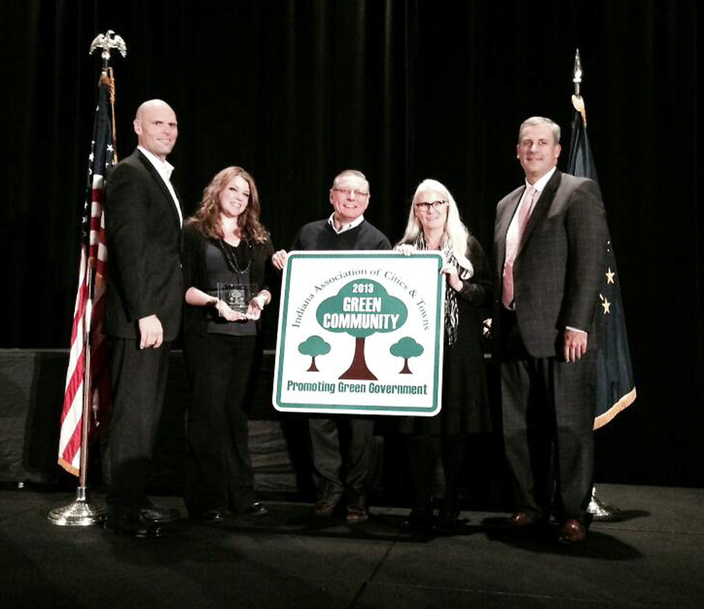 From left: Deputy Mayor Todd Burtron, Teresa Evans of Westfield’s Communications Dept., City Council President Jim Ake, Parks and Recreation Director Melody Jones and IACT Executive Director Matt Greller. Indiana Association of Cities and Towns hold the city’s Green Community of the Year award. (Submitted photo)