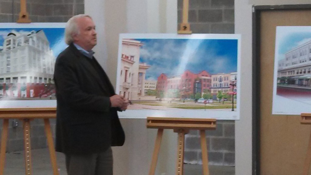 Pedcor CEO Bruce Cordingley unveils the latest renderings of new buildings planned for City Center. (Staff photo)