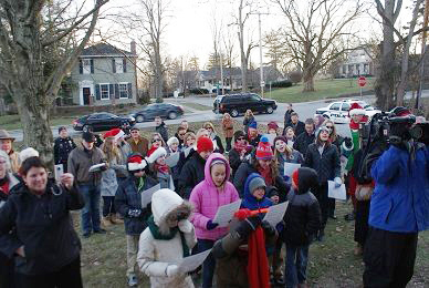 Carolers begin singing in front of the Trimmers’ home. (Submitted photo)