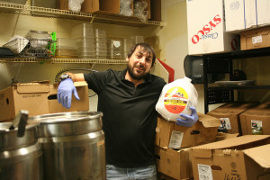 Martin Klekovski in the meat cooler with hundreds of turkeys before Thanksgiving. (Photos by Dawn Pearson)