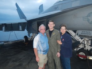 Tom Nicholson and his parents stand in front of a jet during their family trip with the Navy. (Submitted photos)