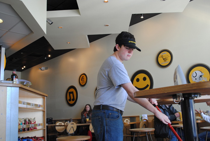 Nick Wimmer has found success at his job as Which Wich sandwich shop in Carmel.
