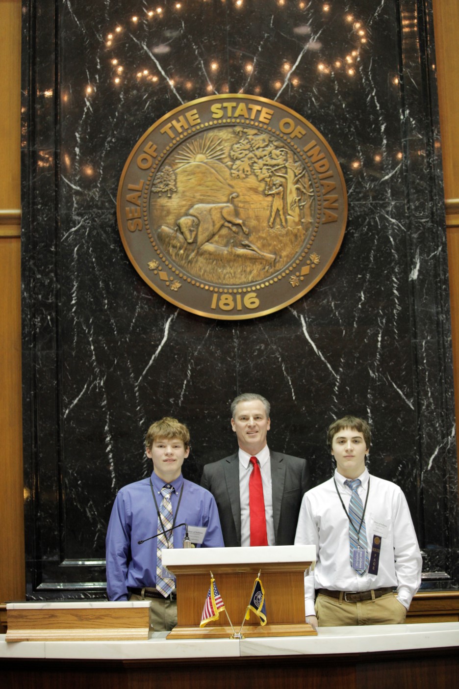 Brian Fuller and Michael Gallagher, eighth graders from Zionsville Middle School, stand with State Rep. Steven Braun. Submitted Photo. 