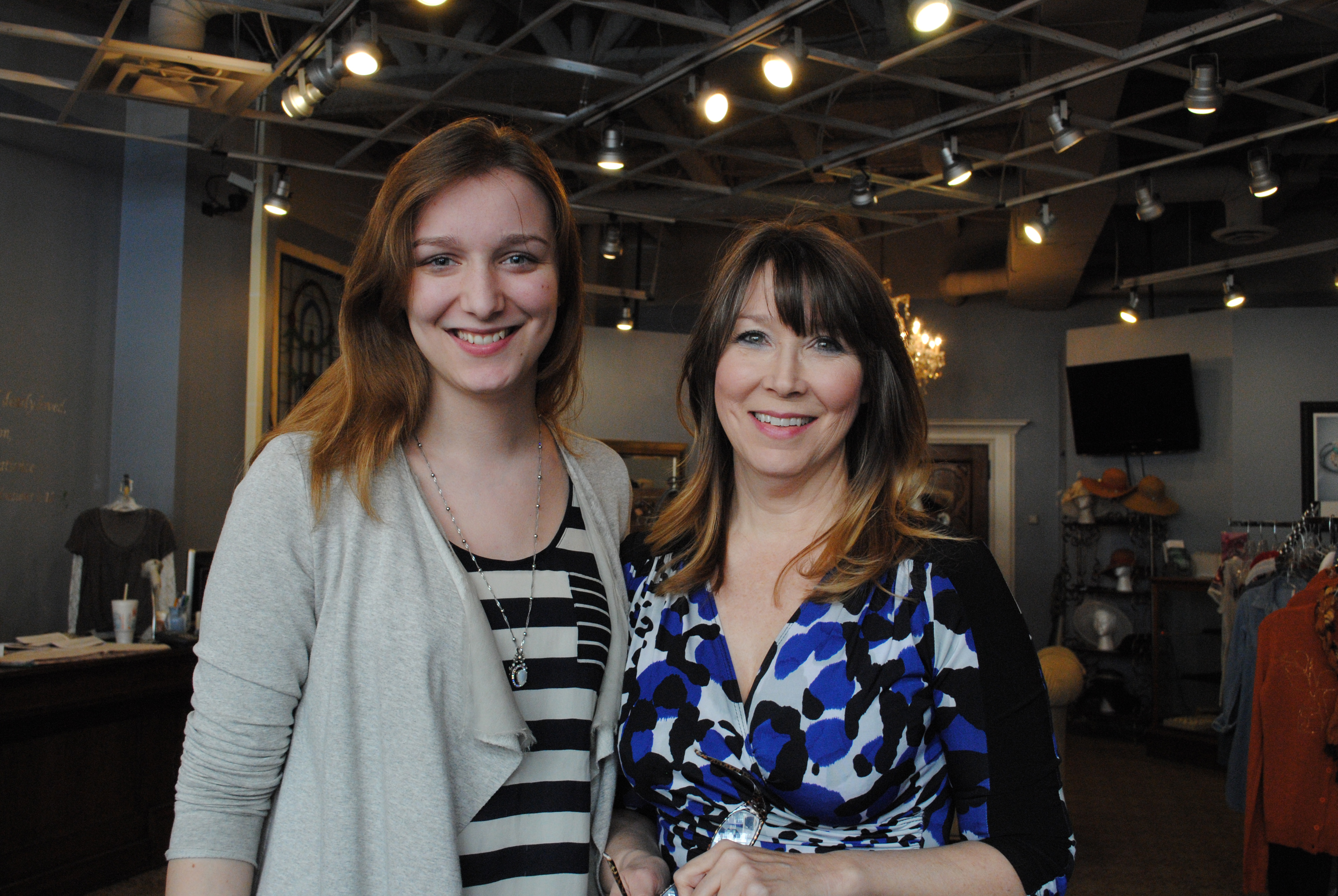Mary & Martha’s Exceedingly Chic Boutique manager Lillian Bernard, left, and owner Laura Shattuck plan to relocate their boutique to Zionsville later this spring. (Staff photo)