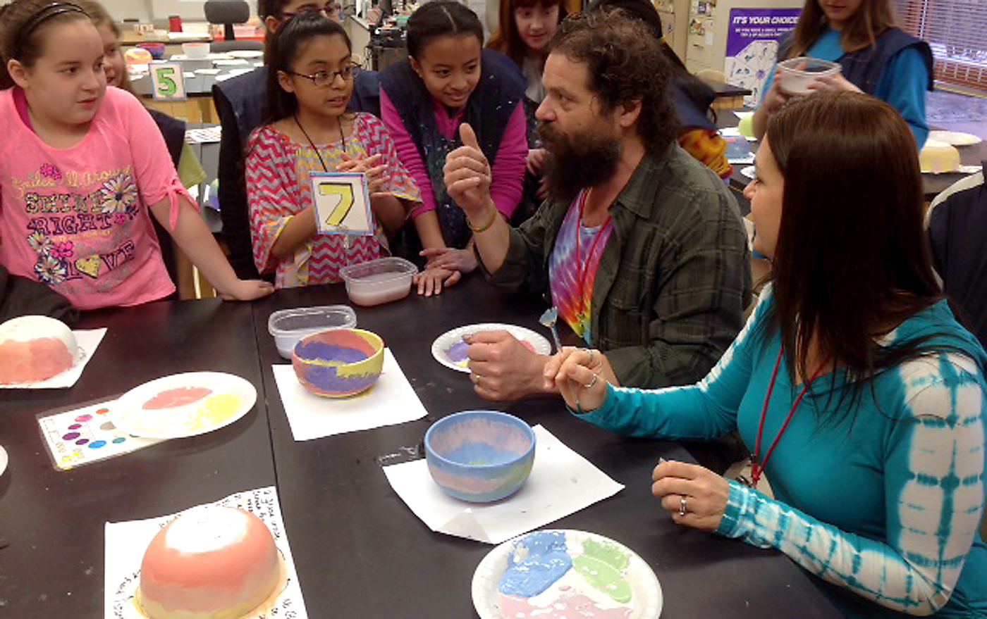 Rupert Boneham of Survivor fame talks to fourth grade students at Washington Woods Elementary. Nearly 1,000 bowls – including the “tie-dyed” ones created by Rupert and Laura Boneham – will be avail- able to the public for a donation from 5 to 7 p.m. April 30 at Westfield Middle School. (Submitted photo)
