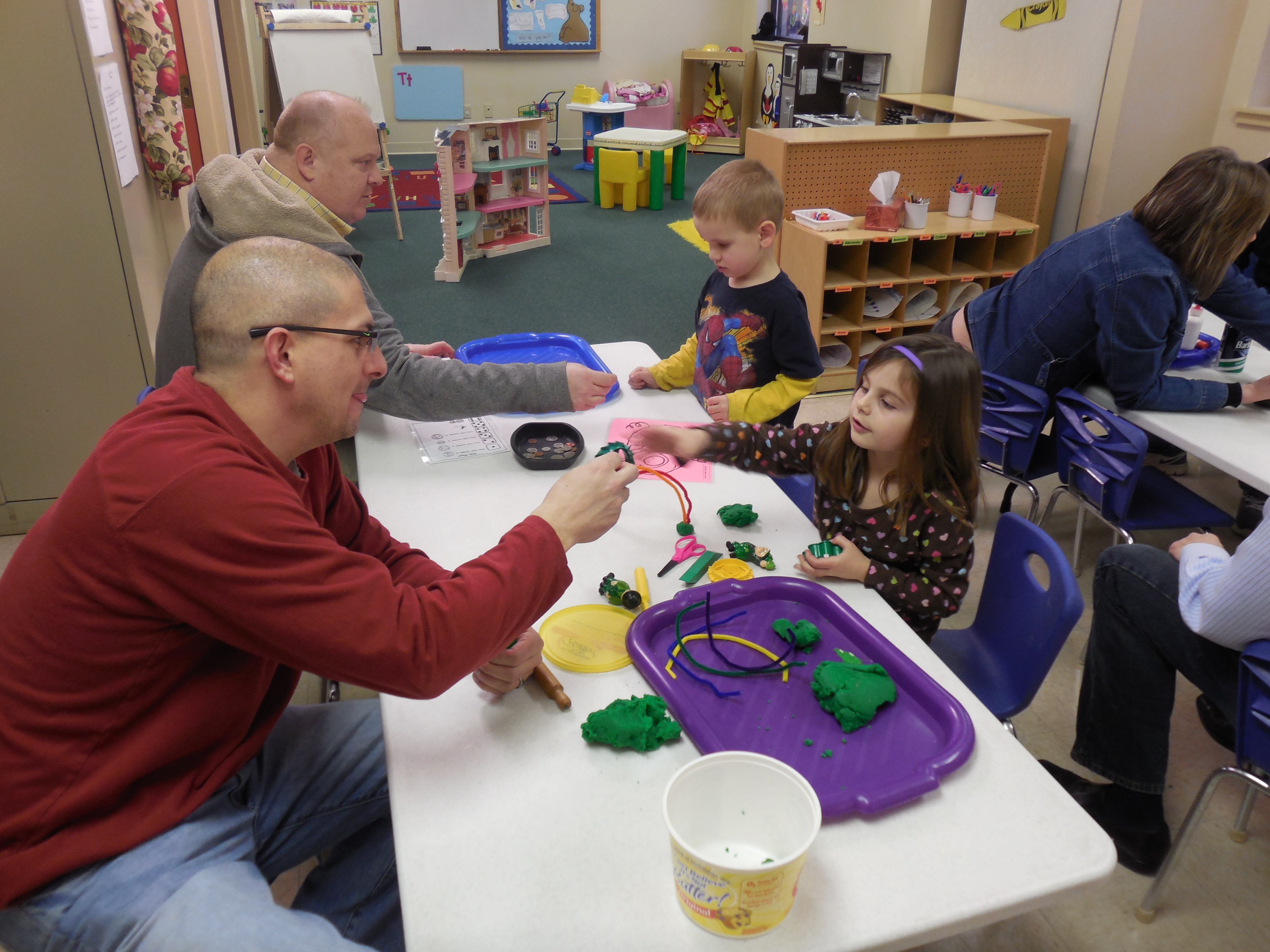 Zionsville Lutheran’s Christ Church preschool hosted “Pops at Preschool,” a time for dads of preschool- ers to join in on activities. Pictured are (front) Jason and Claire Evans and (back) Chuck and Colten Thomas. (Submitted photo)