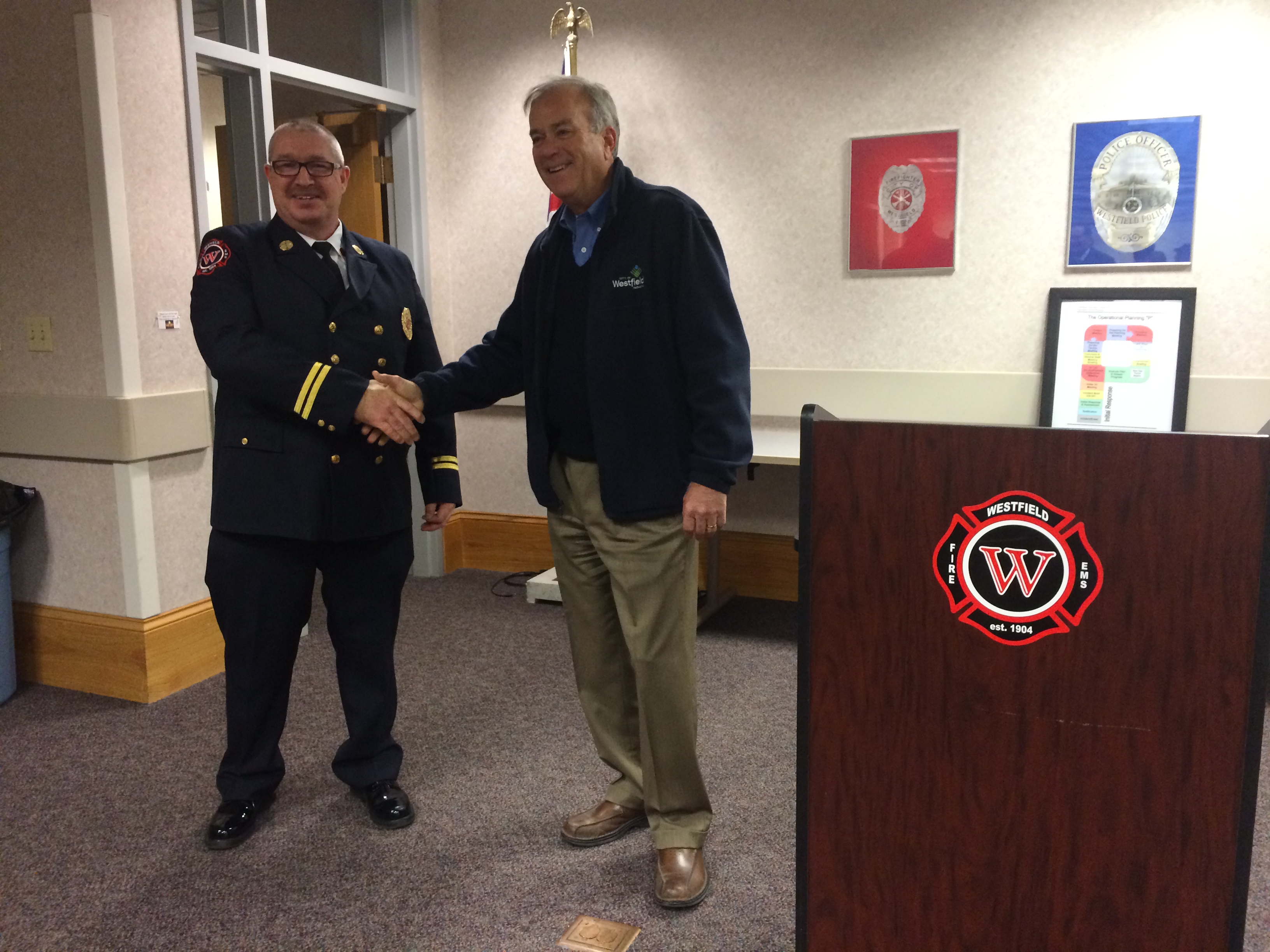 Joe Lyons was appointed as the new Westfield fire chief today by Mayor Andy Cook. Lyons, left, began his career with the department in 1996.