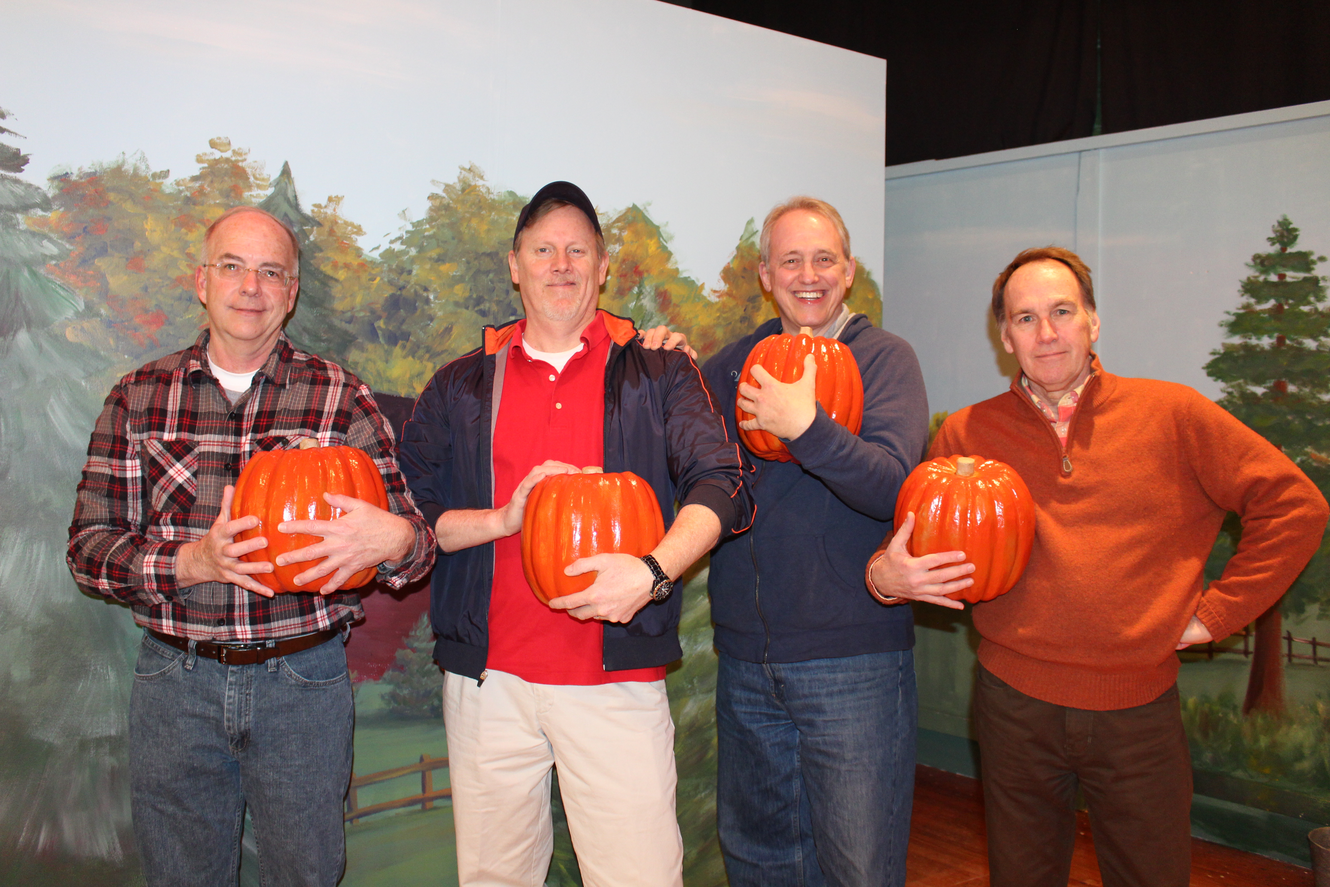 The men of Harmony prepare for the annual pumpkin toss. From left to right: James Hayes, Dave Surina, Will Carlson and Jeff Maess. (Submitted photo)