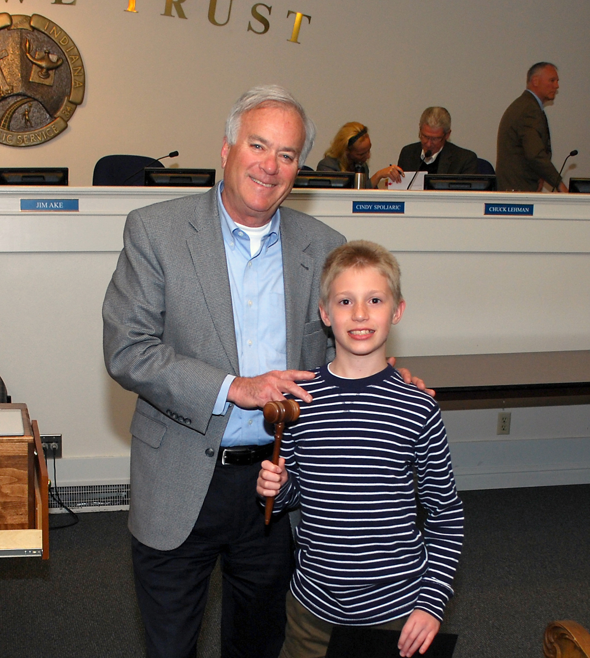 Quinn McConahay assists Mayor Andy Cook in presiding over the Westfield City Council meeting on April 14. (Photo by Robert Herrington)