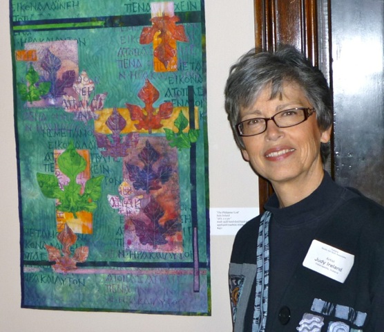 Art in Town Hall featured artist Judy Ireland beside her piece “Philippian Leaf.” (Submitted photo)