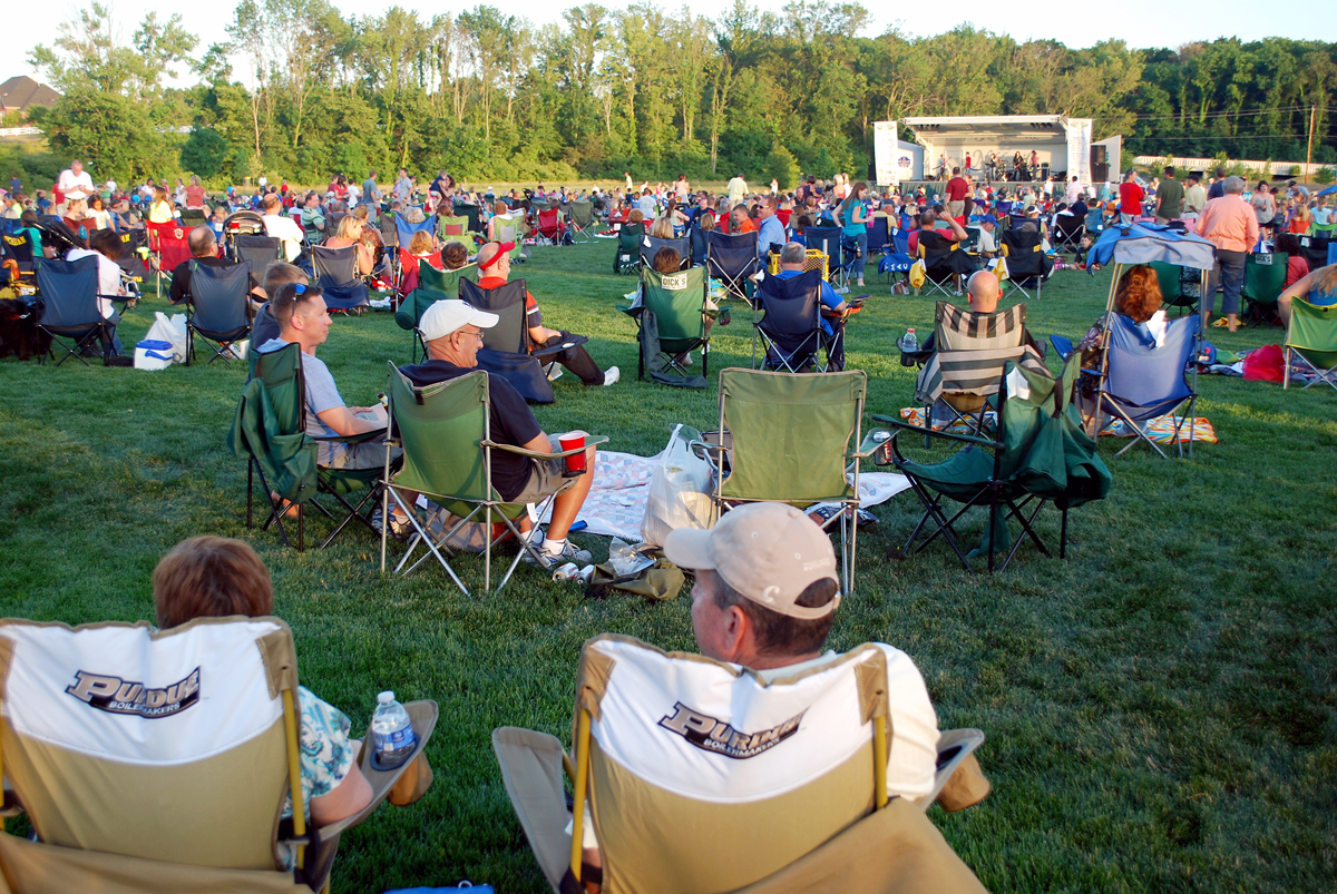 Patrons fill Dillon Park, 6001 Edenshall Lane, to watch Zanna-Doo perform as part of the 2012 concert series. Zanna-Doo will perform July 10 at Forest Park. (File photo by Robert Herrington)