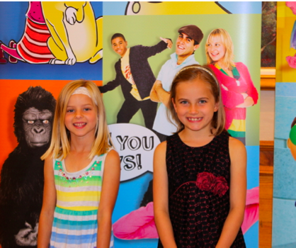 From left: Saylor Schuckman and Cate Schrepferman stand together after winning the PBS Kids Writers Contest last week. 