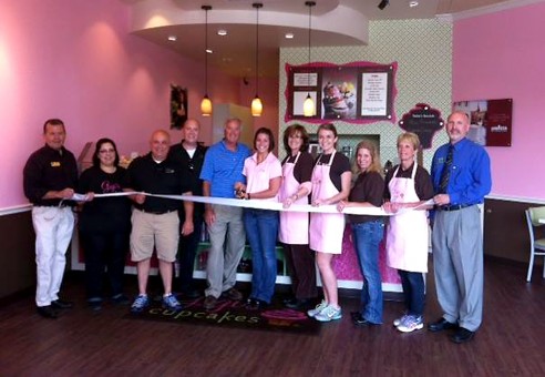 Art: GiGi’s Cupcake, which opened and held its ribbon cutting on May 29, bakes its cupcakes fresh in the store daily a and has a different menu for each day of the week. (Photo by Anna Skinner)