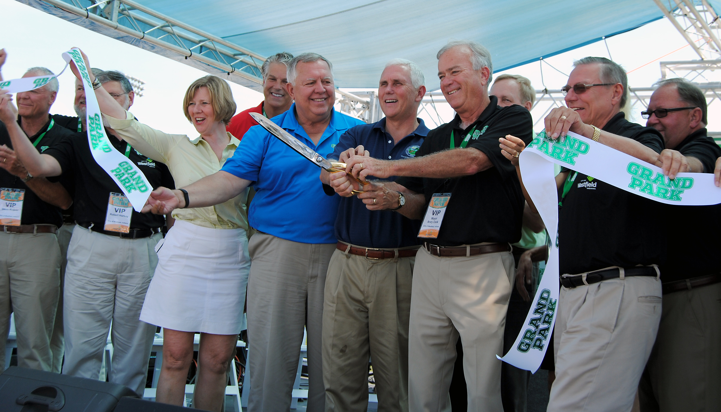 Members of the Westfield City Council surround U.S. Rep Susan Brooks (R-Ind.), developer Steve Henke, Gov. Mike Pence and Mayor Andy Cook at the ribbon cutting on June 21. (Photo by Robert Herrington)