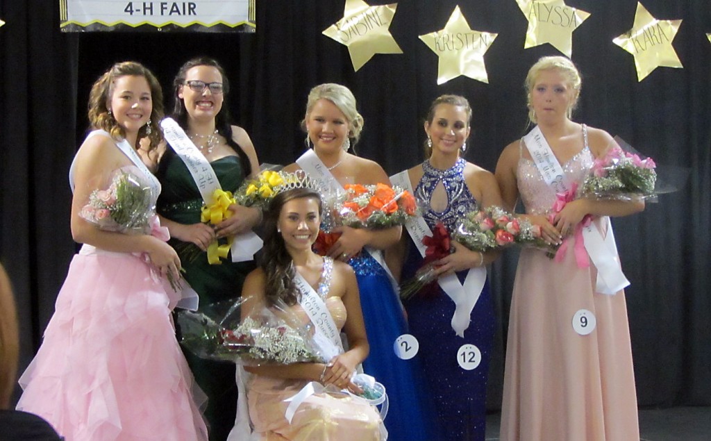 From left: The 2014 Hamilton County 4-H Fair Queen’s Court members are Kendall Gatewood, Kara Moody, Rachel Flanders, Victoria Comin, Alyssa Wilmot (Miss Congeniality), and Queen Erica Danielle Freeman (seated).
