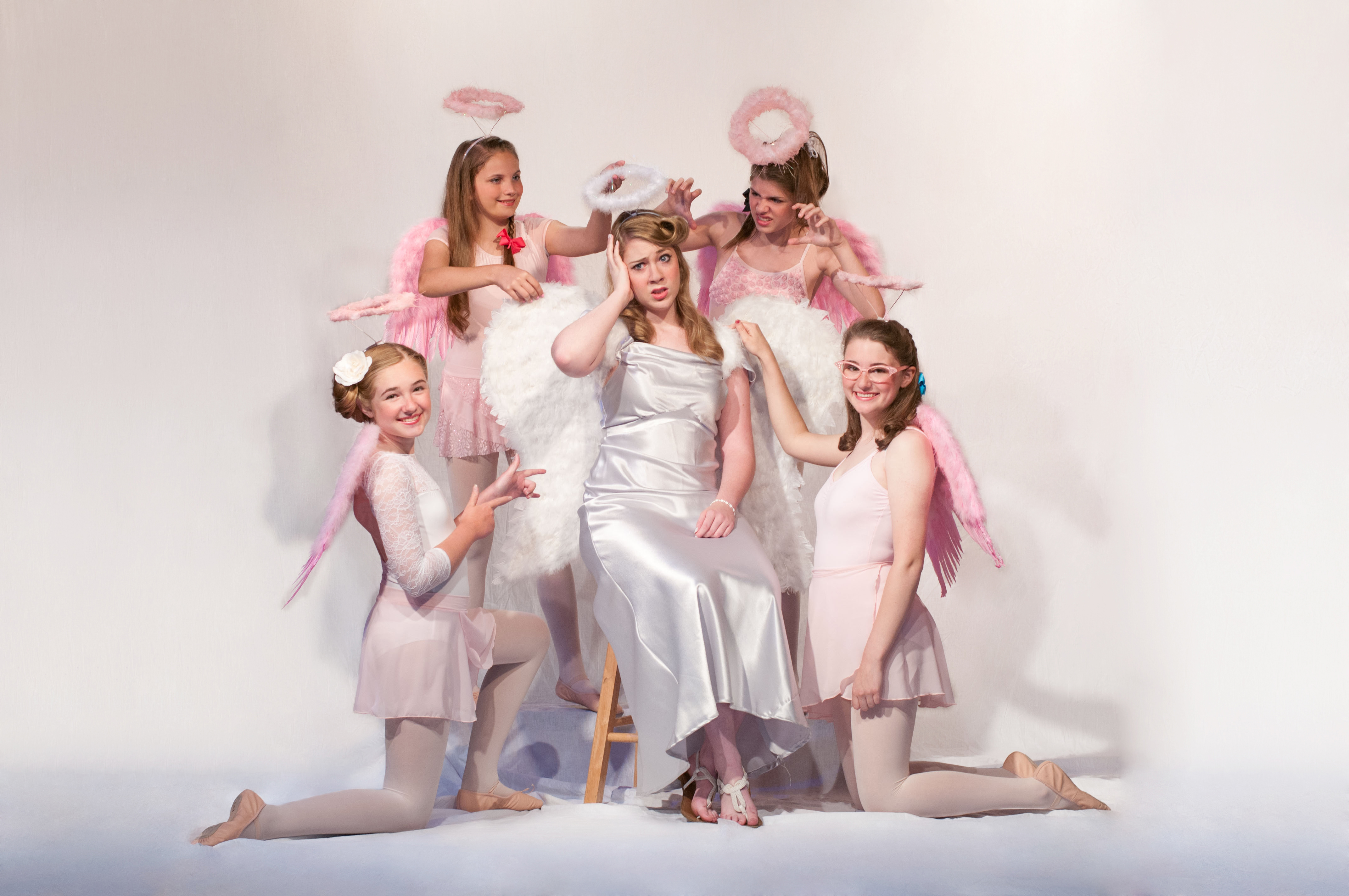 From left: Emma Hedrick, Ava Benvenutti, Addy Monger, Piper Williams and Rachel Smith play angels in Carmel Community Players performance of “I Married an Angel.” (Submitted photo)