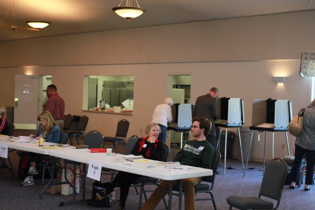 Voters visit the polls during the May primaries earlier this year. This fall, voters will see more flexibility in voting times and locations. (Photo by Keith Shepherd)