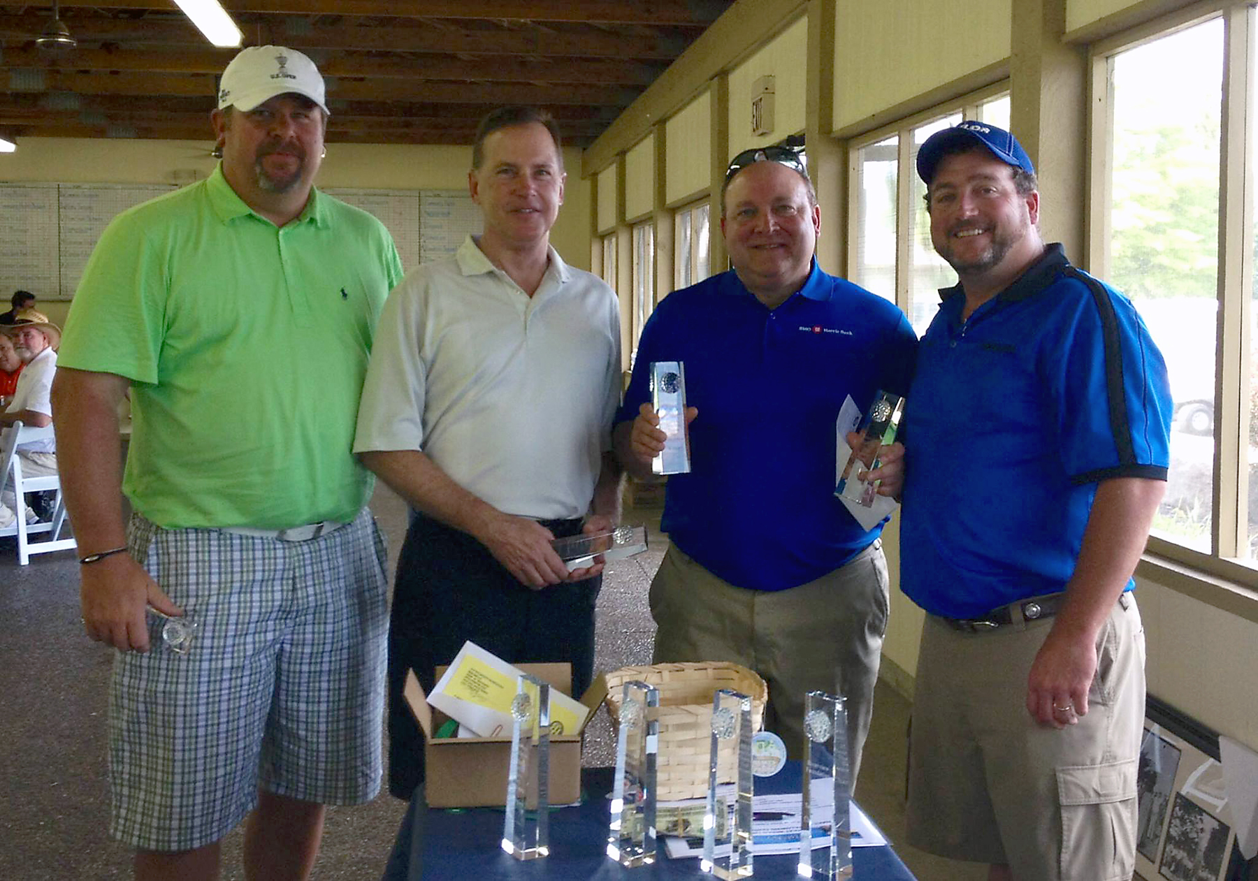 From left: Mark Bilger, John Kirkwood, Greg O’Connor and Chuck Goodrich, Riverview Hospital Foundation Board Chair. Mark Midkiff also was on the second place BMO Harris team, but not in the picture. (Submitted photo)