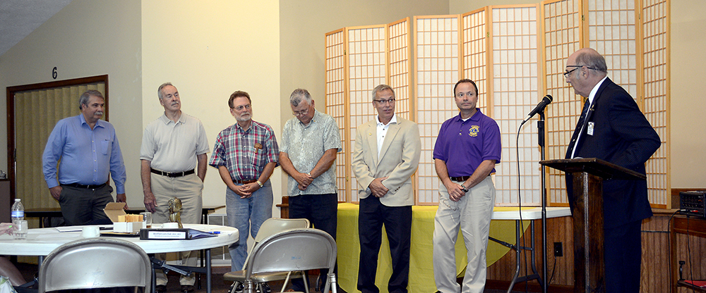 From left: Board members Craig Cooley and Ron Perkins, “Tail Twister” Larry Clarino, treasurer Joe Ed- wards, secretary Jeff Larrison and first vice president Dave Sobczak are inducted as Westfield officers by Jim Thompson, past district governor and member of the Carmel Lions Club.