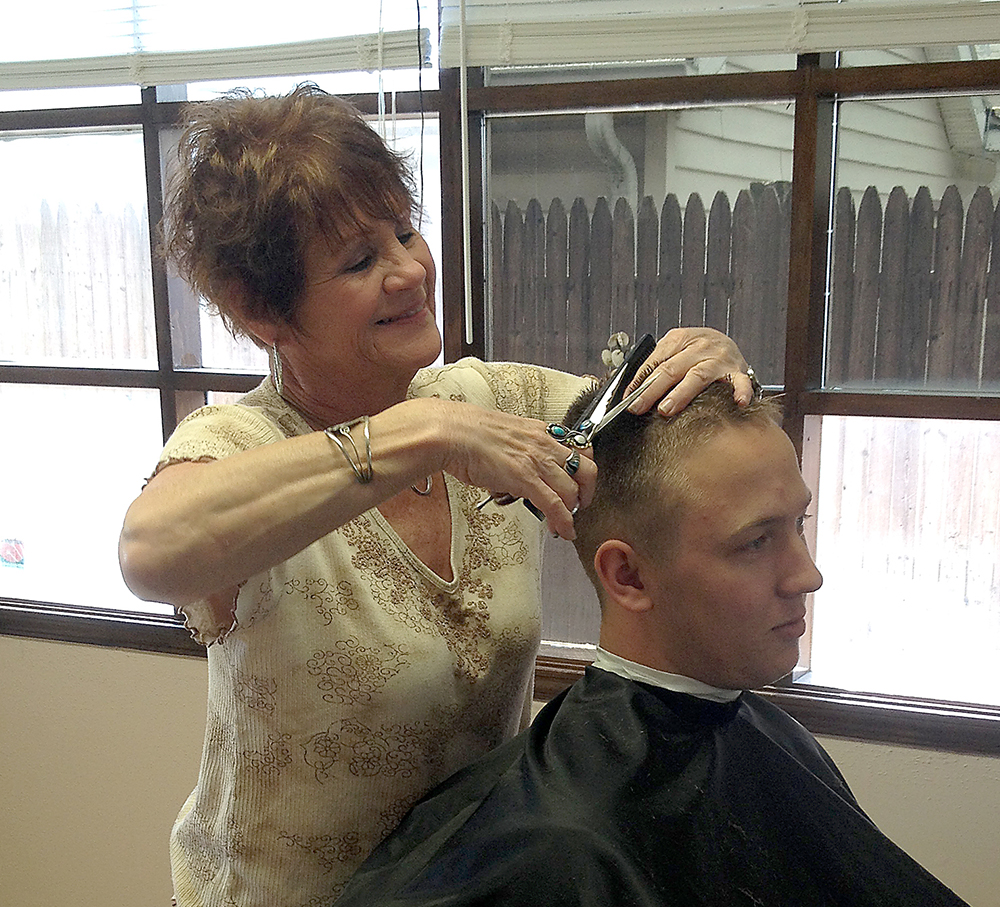 Pam Duff has been cutting hair for 35 years and now runs her own shop on Main Street. (Photo by Brianna Susnak) 