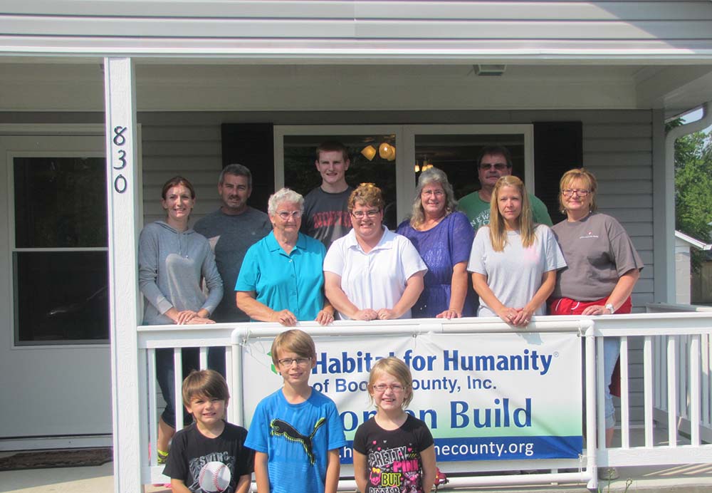 Phyllis McKinney stands with her grandchildren and team builders in front of her new Lebanon home. (Submitted photo)